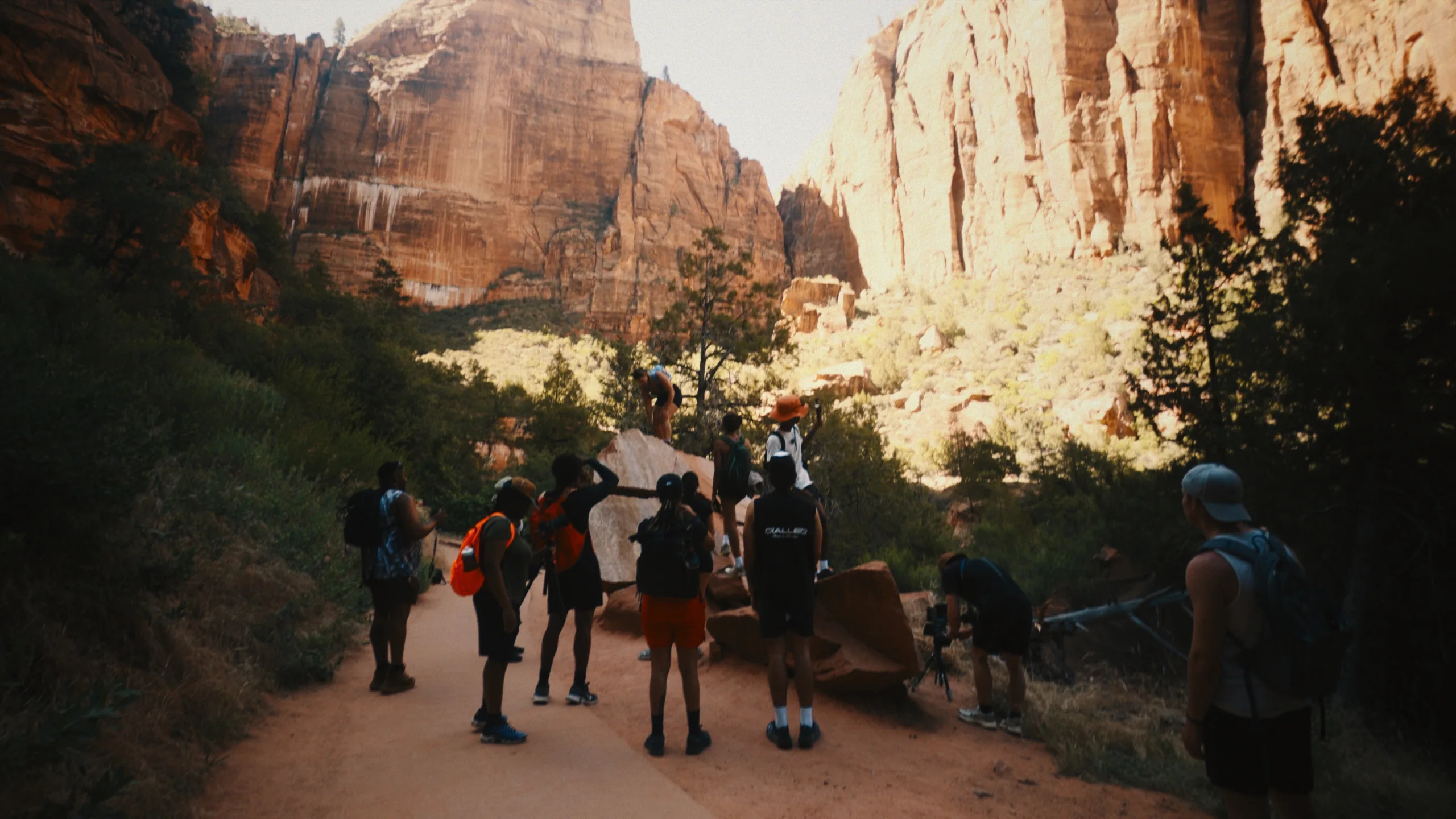 Canyon trail group hike frame, before and after a Blueprint PowerGrade — graded