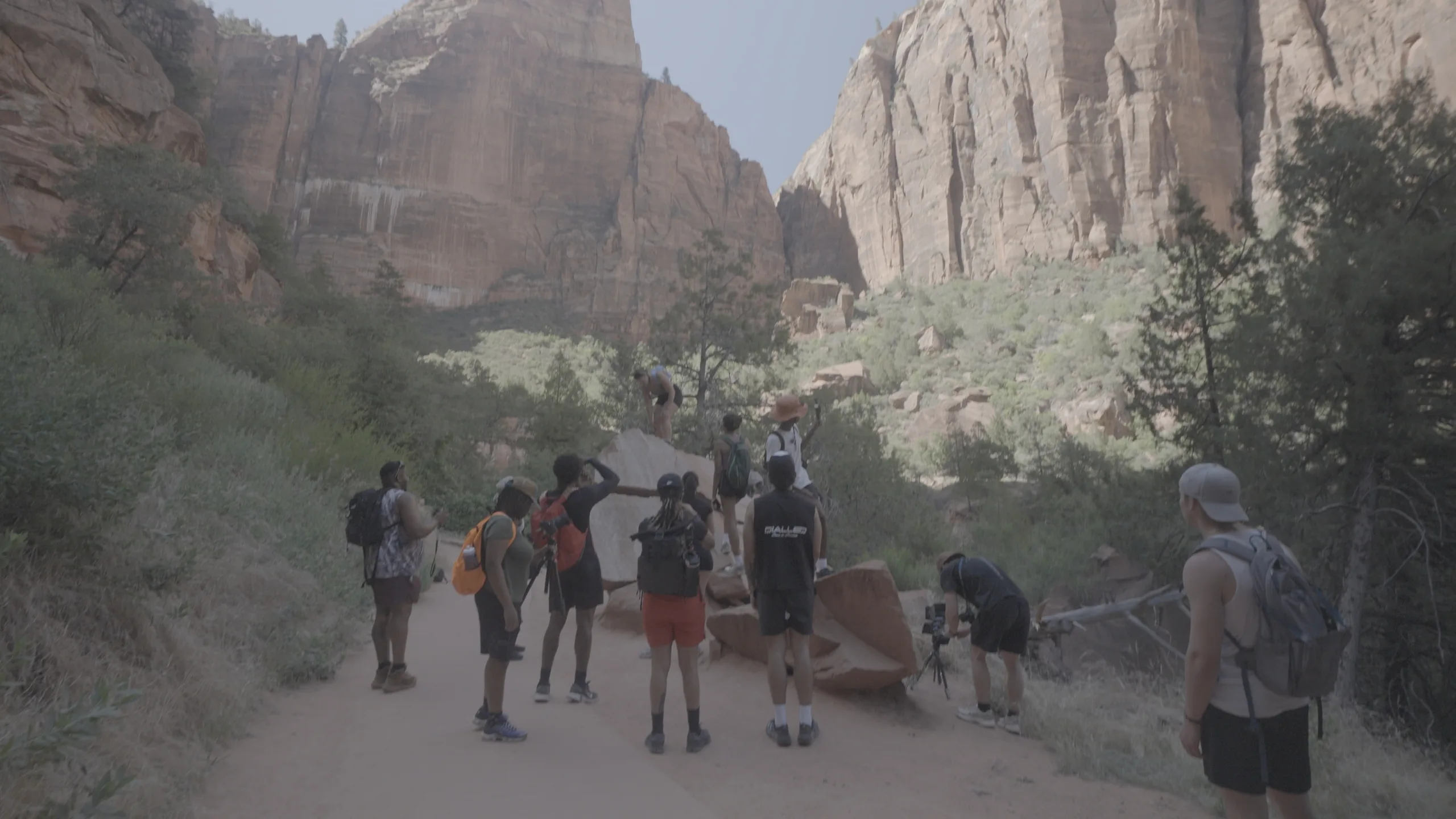 Canyon trail group hike frame, before and after a Blueprint PowerGrade — before grading